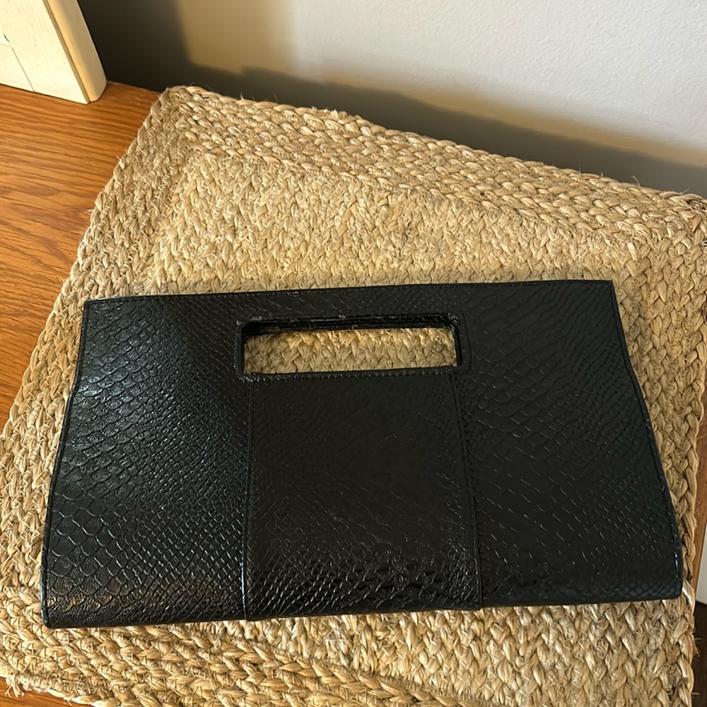 Snake skin black clutch